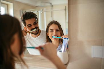 teeth whitening West Seattle WA | couple brushing teeth