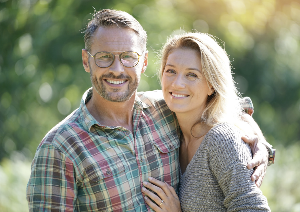 couple smiling | dental crown west seattle