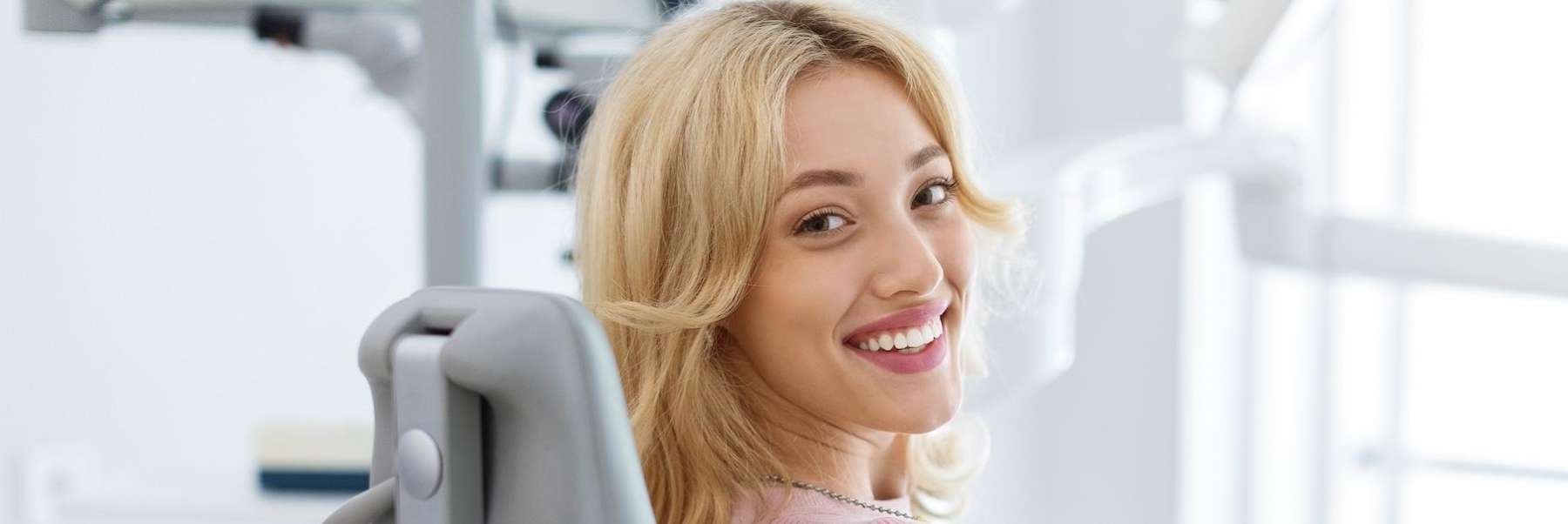 holistic dentist seattle | woman at dentist