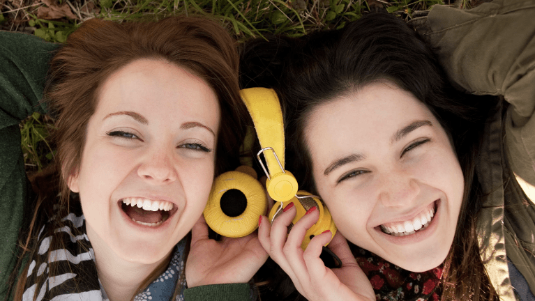 west seattle teeth whitening | teens listening to music