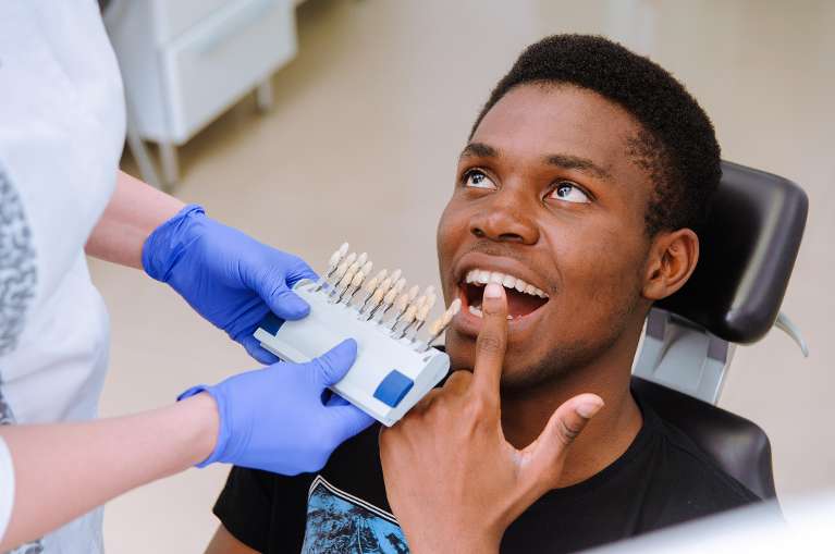 teeth whitening west seattle | man at dentist