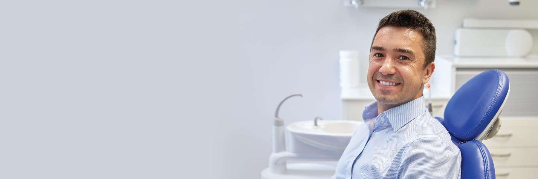 dental crown west seattle | man at dentist